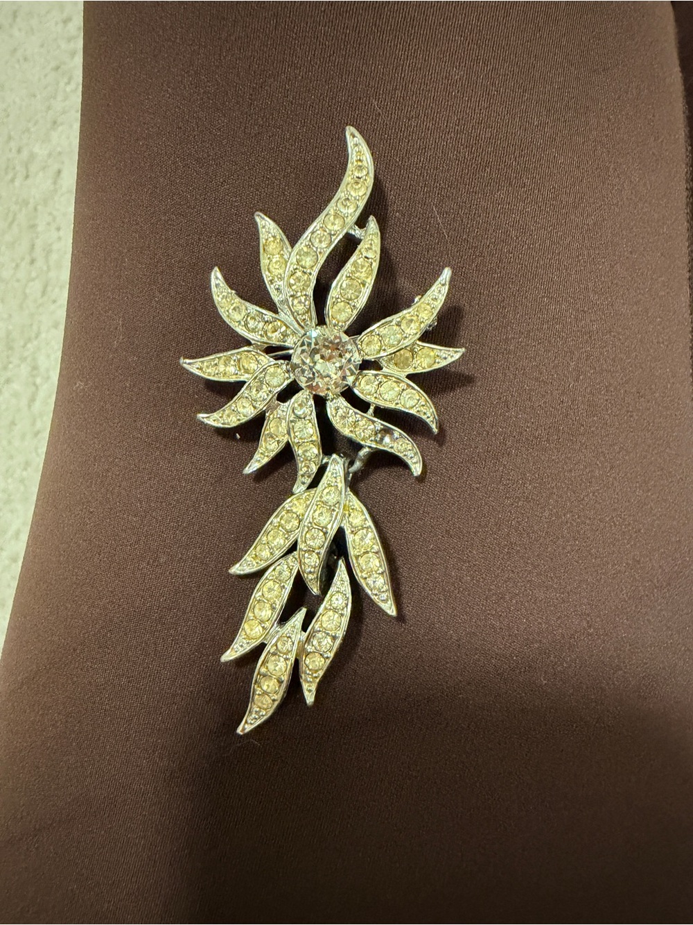 Crystal Floral Drop Brooch in Gold Tone one missing stone and age discoloration